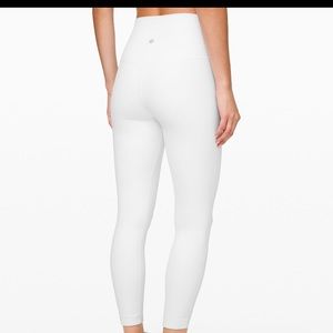 White Lululemon leggings. Worn only once or twice. Are really nice for the gym.